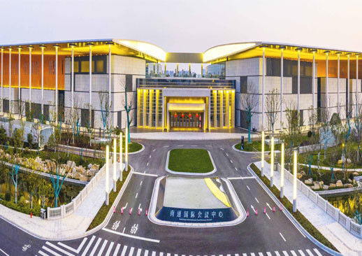 গুণ  The form of a pavilion with two wings organizes function and space of Nantong International Convention and Exhibition Ce কারখানা